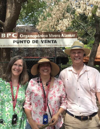 Charlie with farmers at garden coop in Cuba