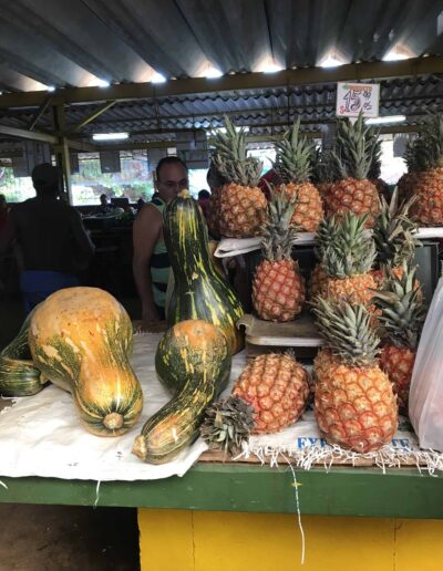 Vegetables in Cuban Market including pineapples and squash