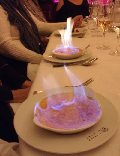 Flaming Dessert at dinner in Paris restaurant