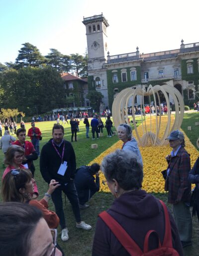 People gathering at Lake Como Garden Festival in Italy
