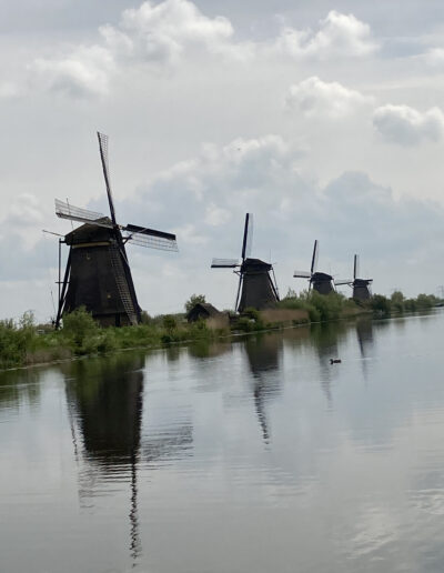 Dutch windmill along a canal in Holland